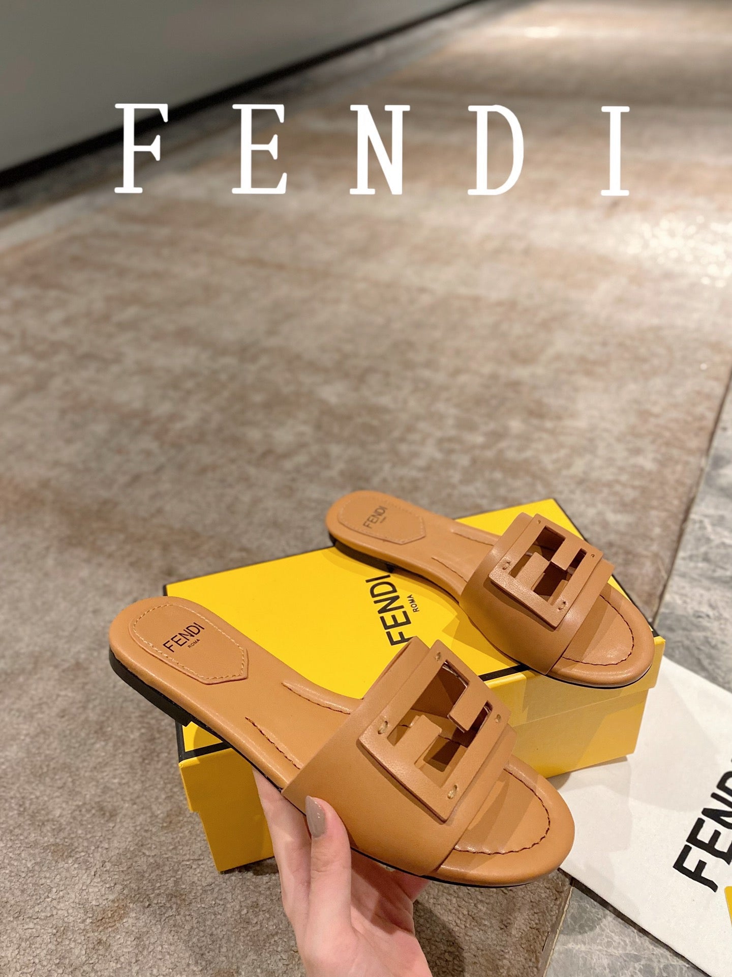 FENDI BAGUETTE SLIDES IN COPPER BROWN LAMBSKIN
