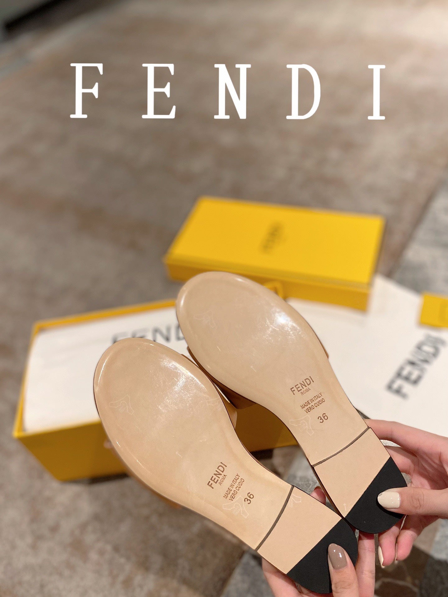 FENDI BAGUETTE SLIDES IN COPPER BROWN LAMBSKIN