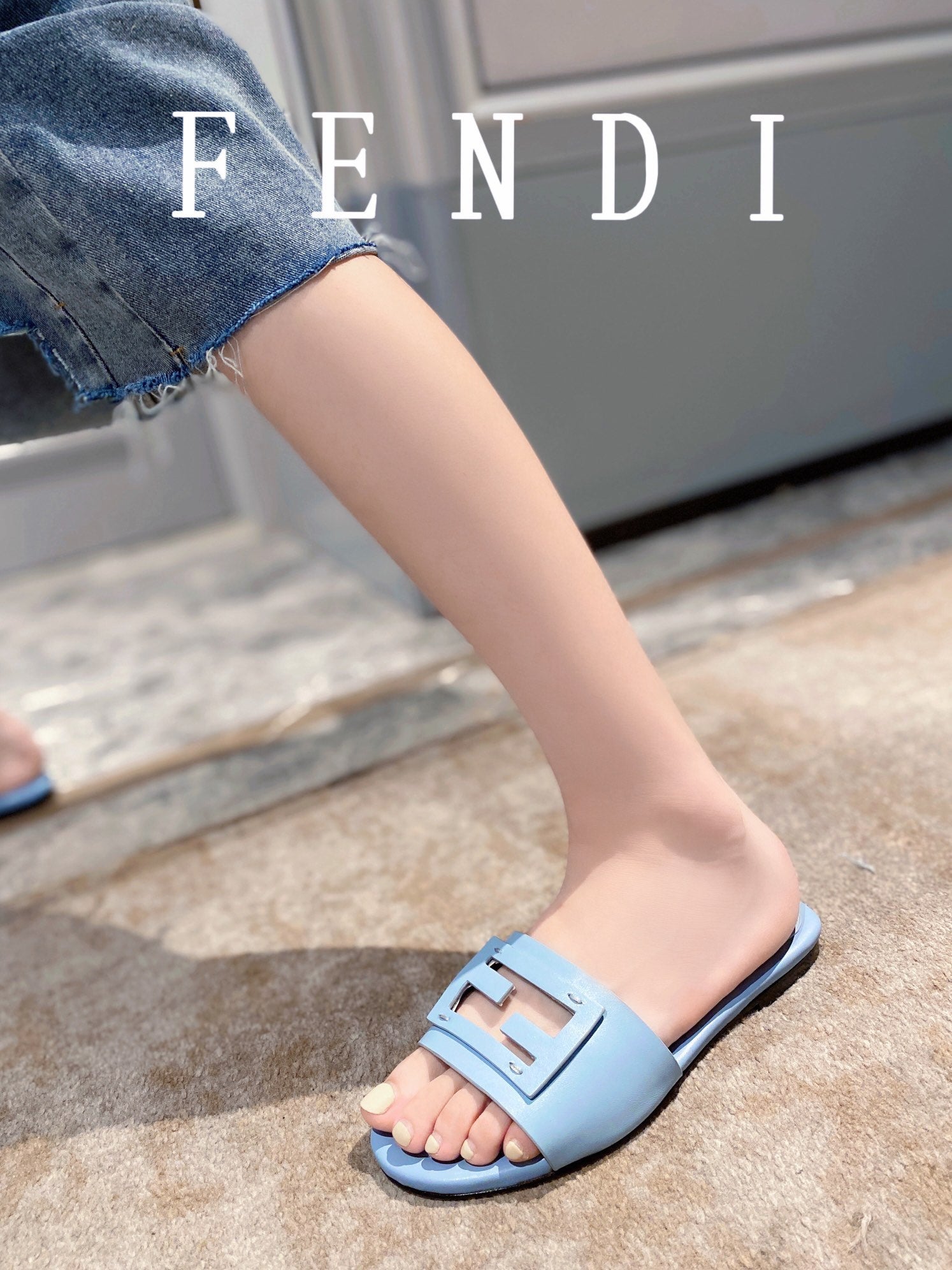 FENDI BAGUETTE SLIDES IN BABY BLUE LAMBSKIN