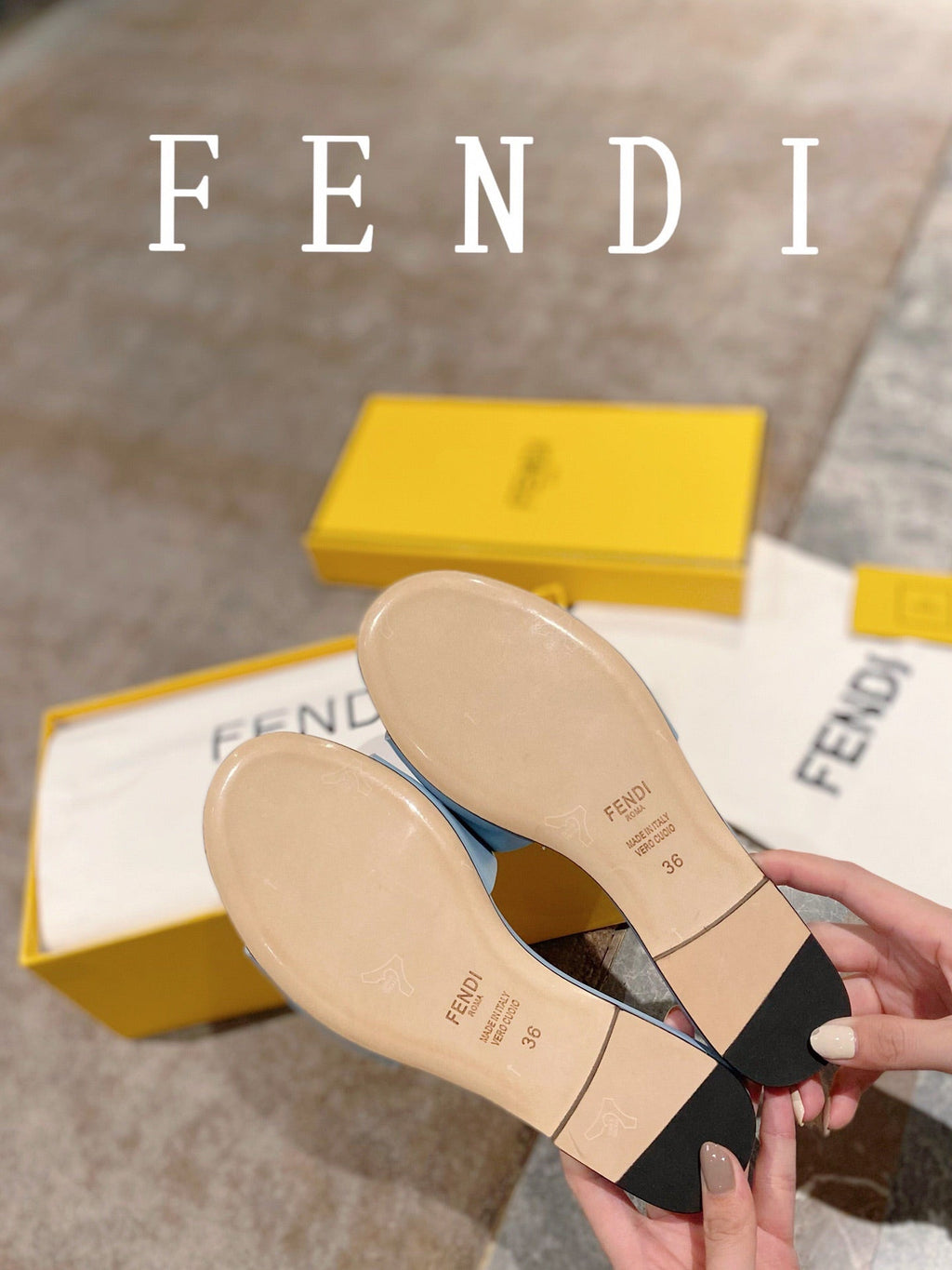 FENDI BAGUETTE SLIDES IN BABY BLUE LAMBSKIN