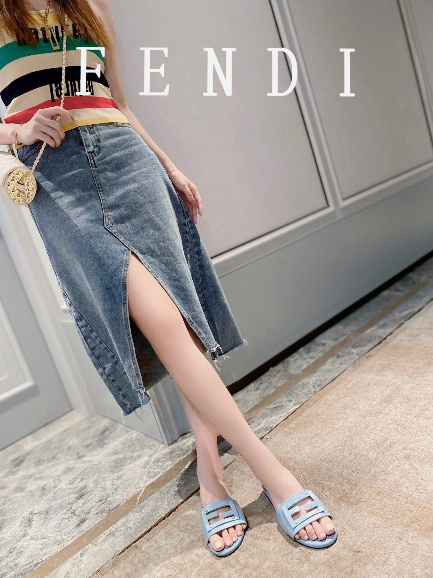 FENDI BAGUETTE SLIDES IN BABY BLUE LAMBSKIN