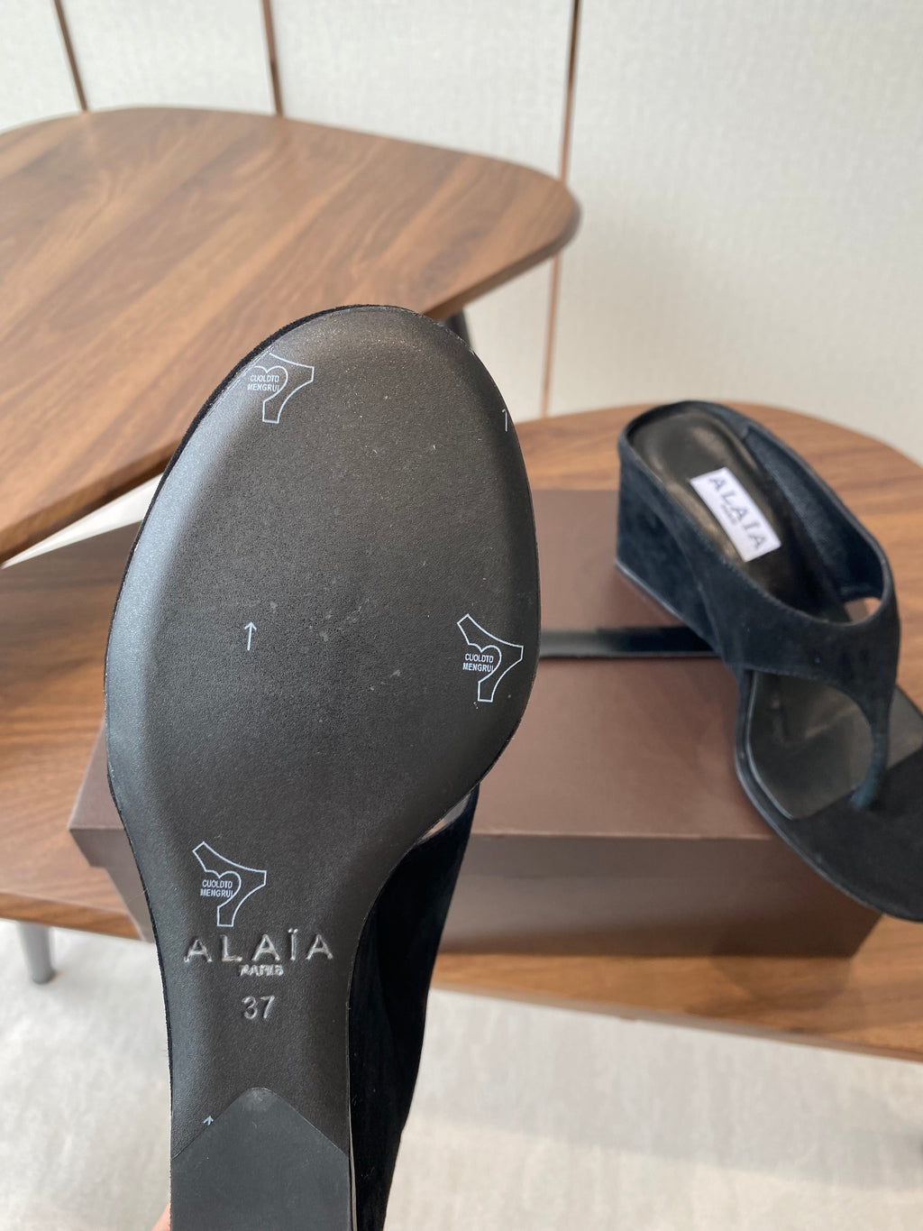 ALAIA WEDGE THONG SANDALS 25S IN BLACK SUEDE