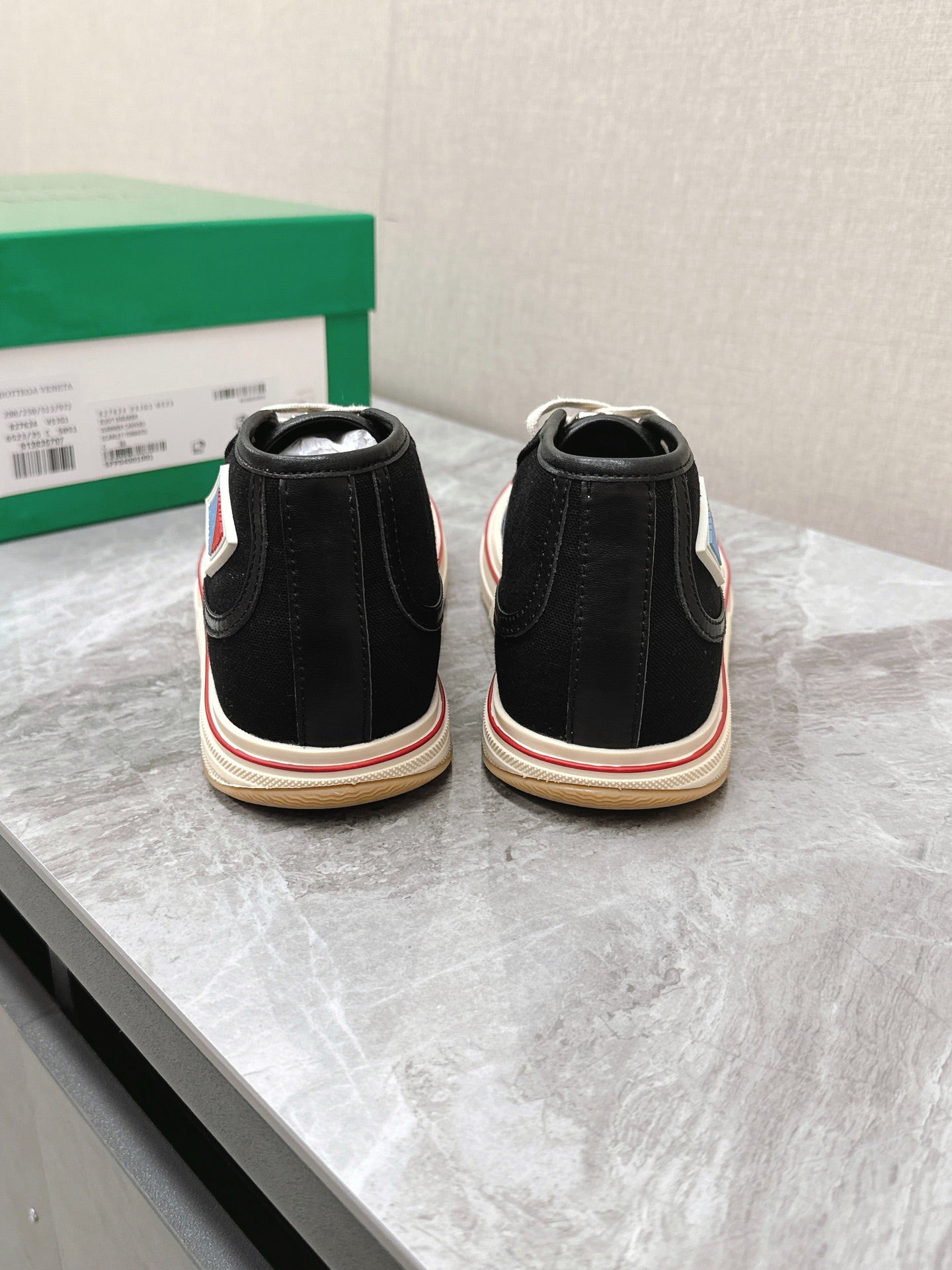 BOTTEGA VENETA ELIOT SNEAKER IN BLACK MIX BLUE AND RED CANVAS AND CALFSKIN
