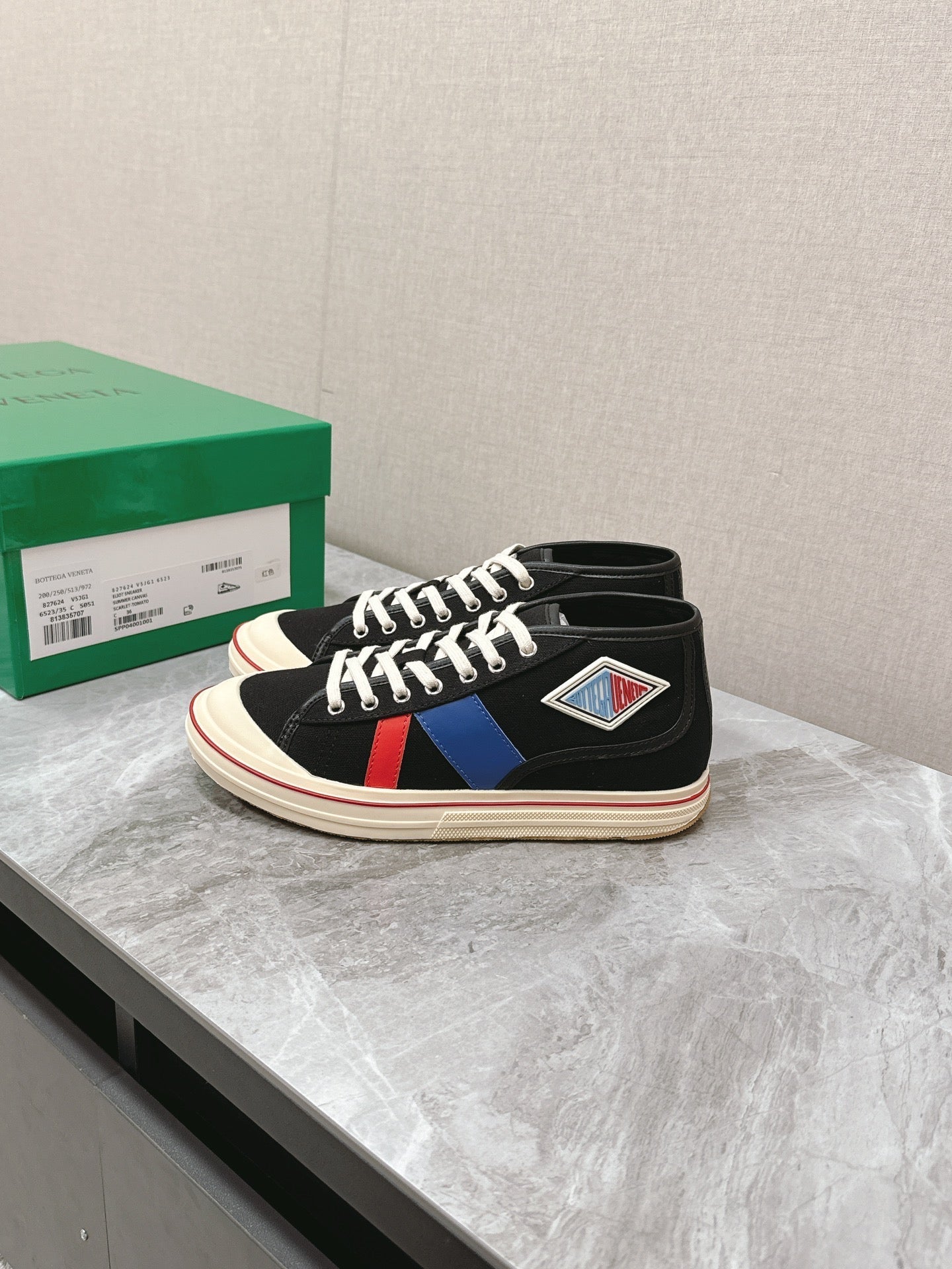 BOTTEGA VENETA ELIOT SNEAKER IN BLACK MIX BLUE AND RED CANVAS AND CALFSKIN