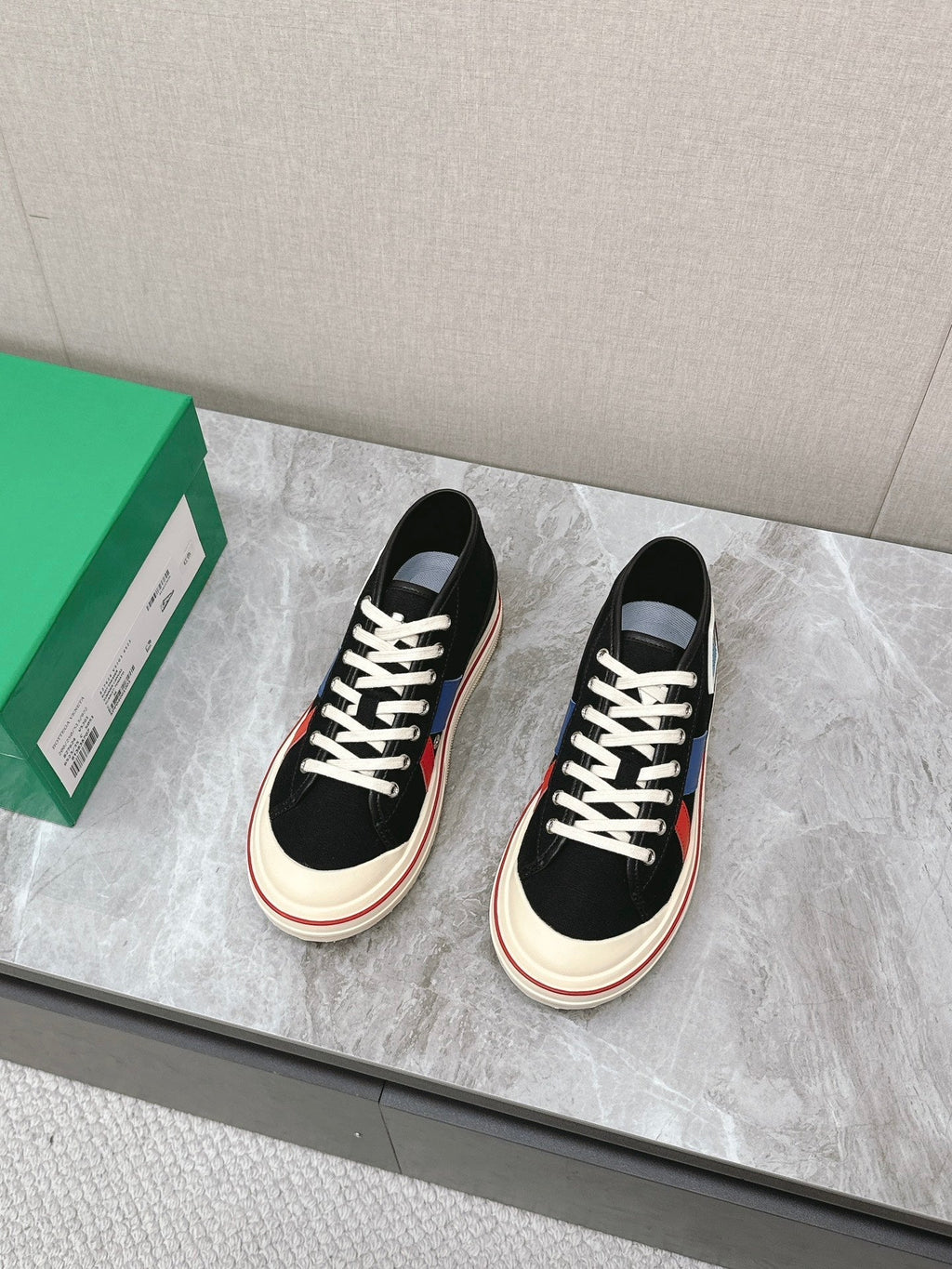 BOTTEGA VENETA ELIOT SNEAKER IN BLACK MIX BLUE AND RED CANVAS AND CALFSKIN