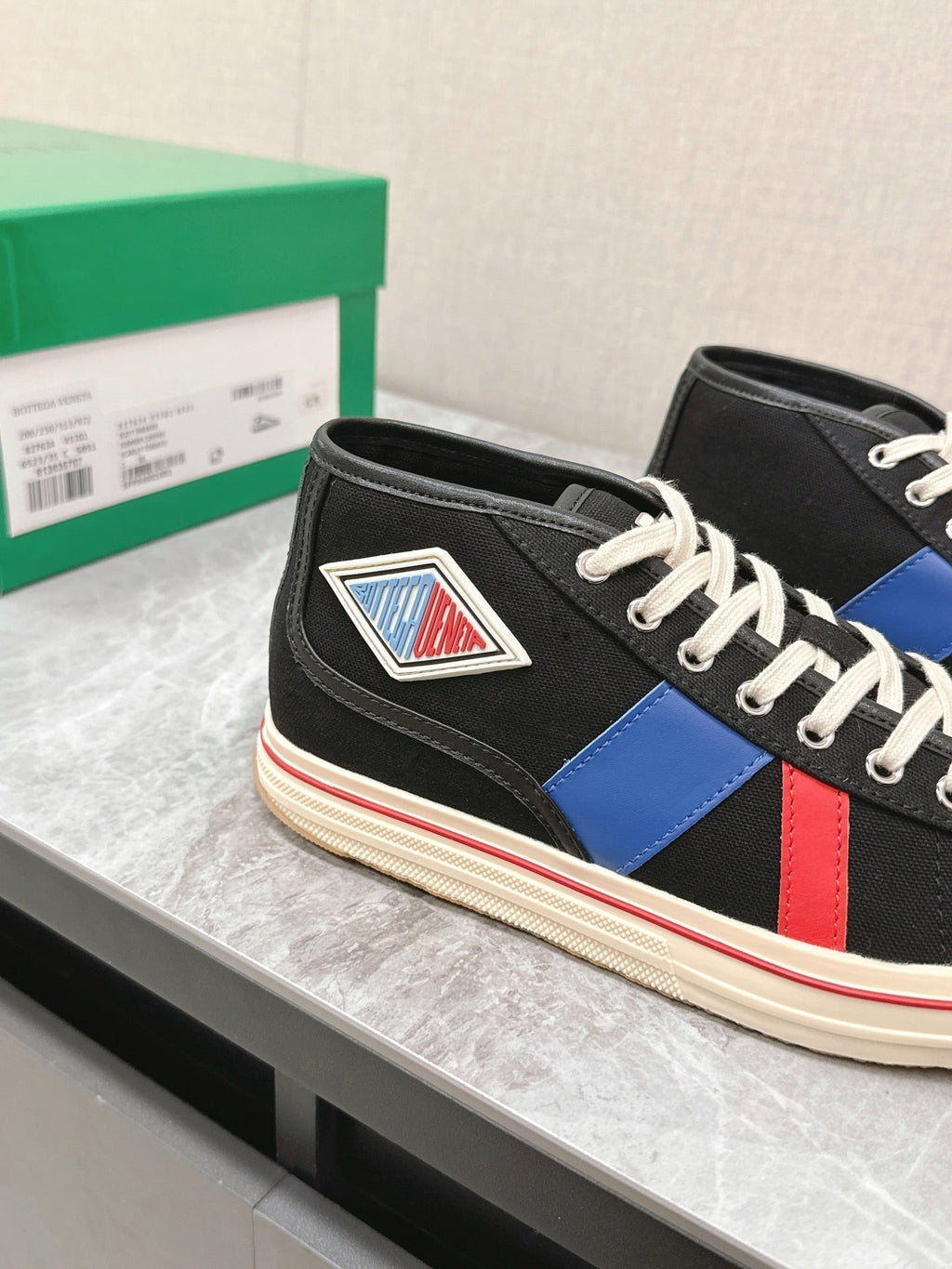 BOTTEGA VENETA ELIOT SNEAKER IN BLACK MIX BLUE AND RED CANVAS AND CALFSKIN