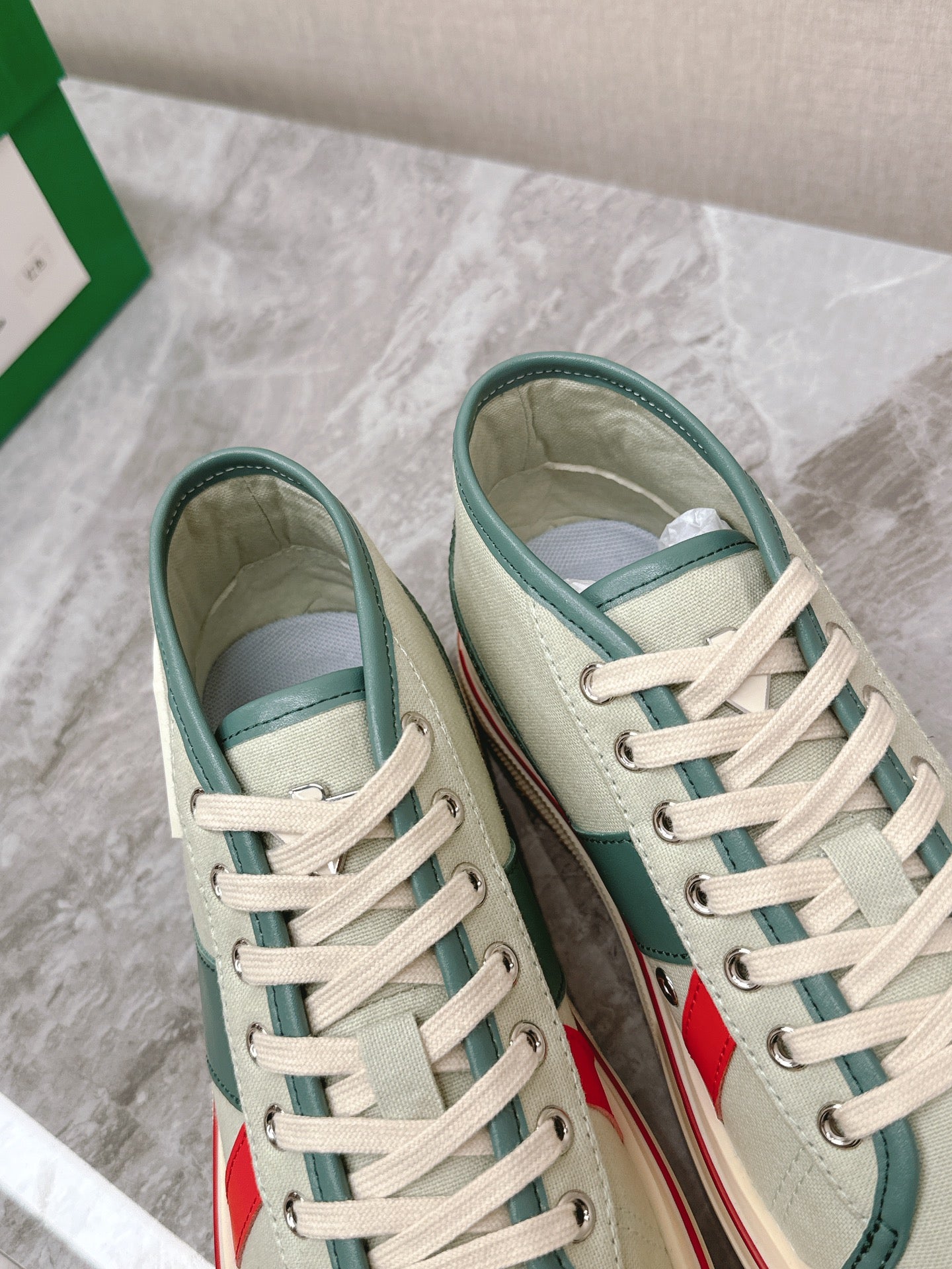 BOTTEGA VENETA ELIOT SNEAKER IN GREEN PASTEL CANVAS AND CALFSKIN