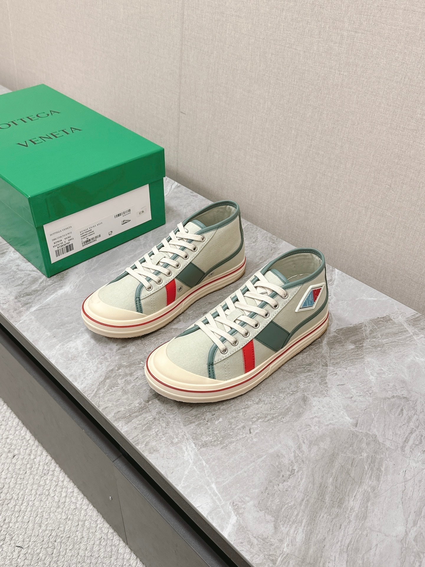 BOTTEGA VENETA ELIOT SNEAKER IN GREEN PASTEL CANVAS AND CALFSKIN
