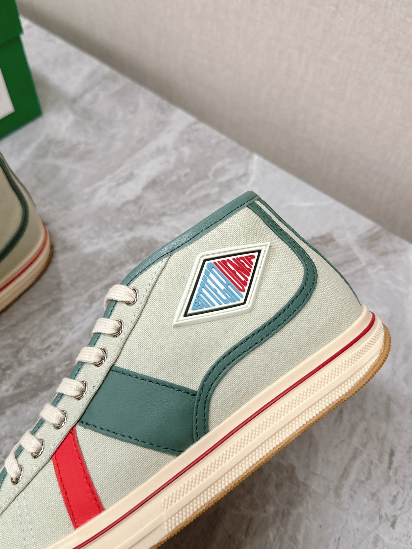 BOTTEGA VENETA ELIOT SNEAKER IN GREEN PASTEL CANVAS AND CALFSKIN