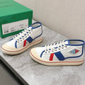BOTTEGA VENETA ELIOT SNEAKER IN WHITE CANVAS WITH NAVY BLUE CALFSKIN