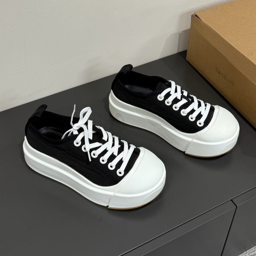 BOTTEGA VENETA VULCAN PLATFORM SNEAKER IN BLACK CANVAS