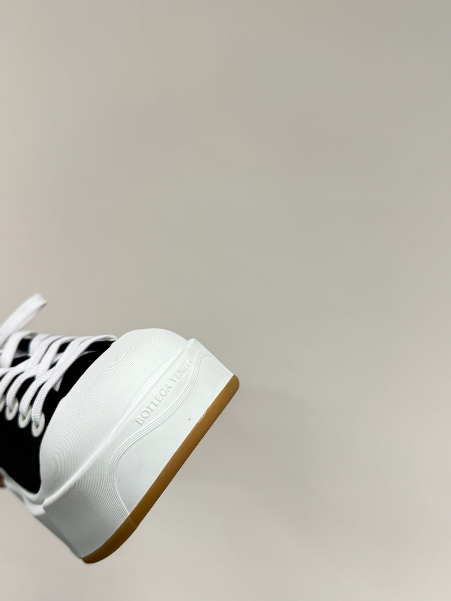 BOTTEGA VENETA VULCAN PLATFORM SNEAKER IN BLACK CANVAS