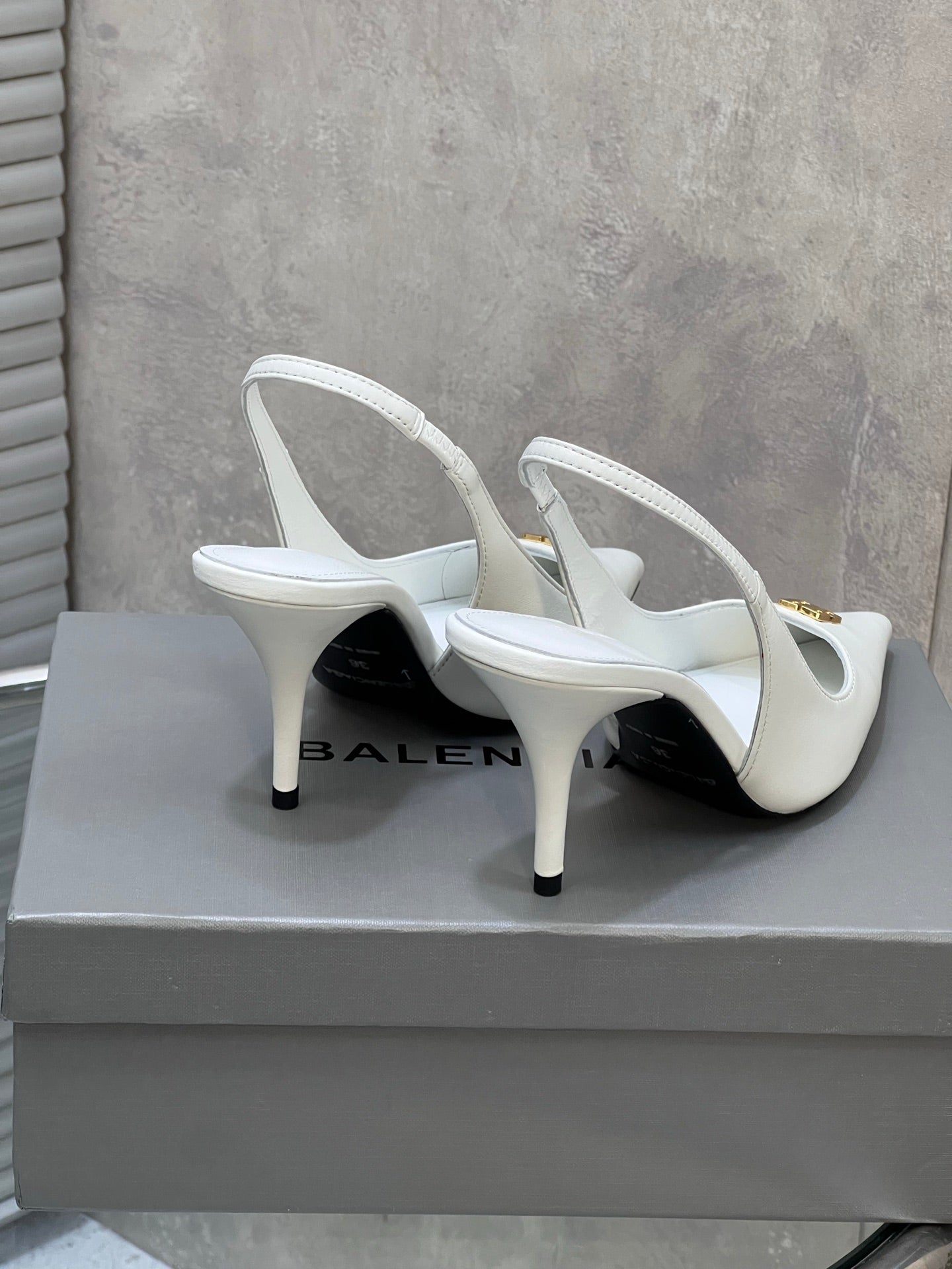 BALENCIAGA 25S HIGH-HEEL SLINGBACK 85 MM IN WHITE COW LEATHER WITH GOLD HARDWARE