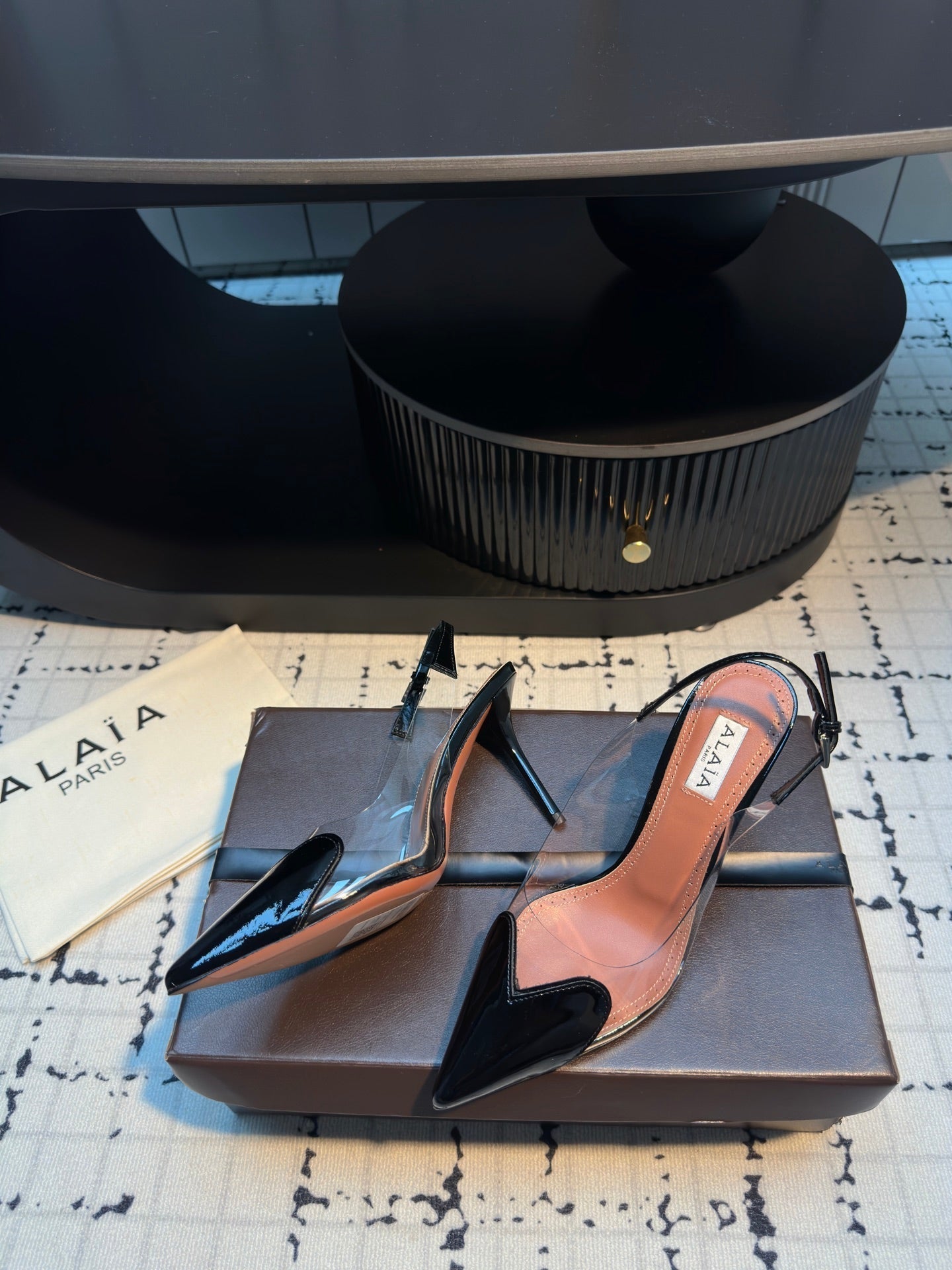 ALAIA HIGH SLINGBACK 25S 90 MM IN BLACK CALFSKIN