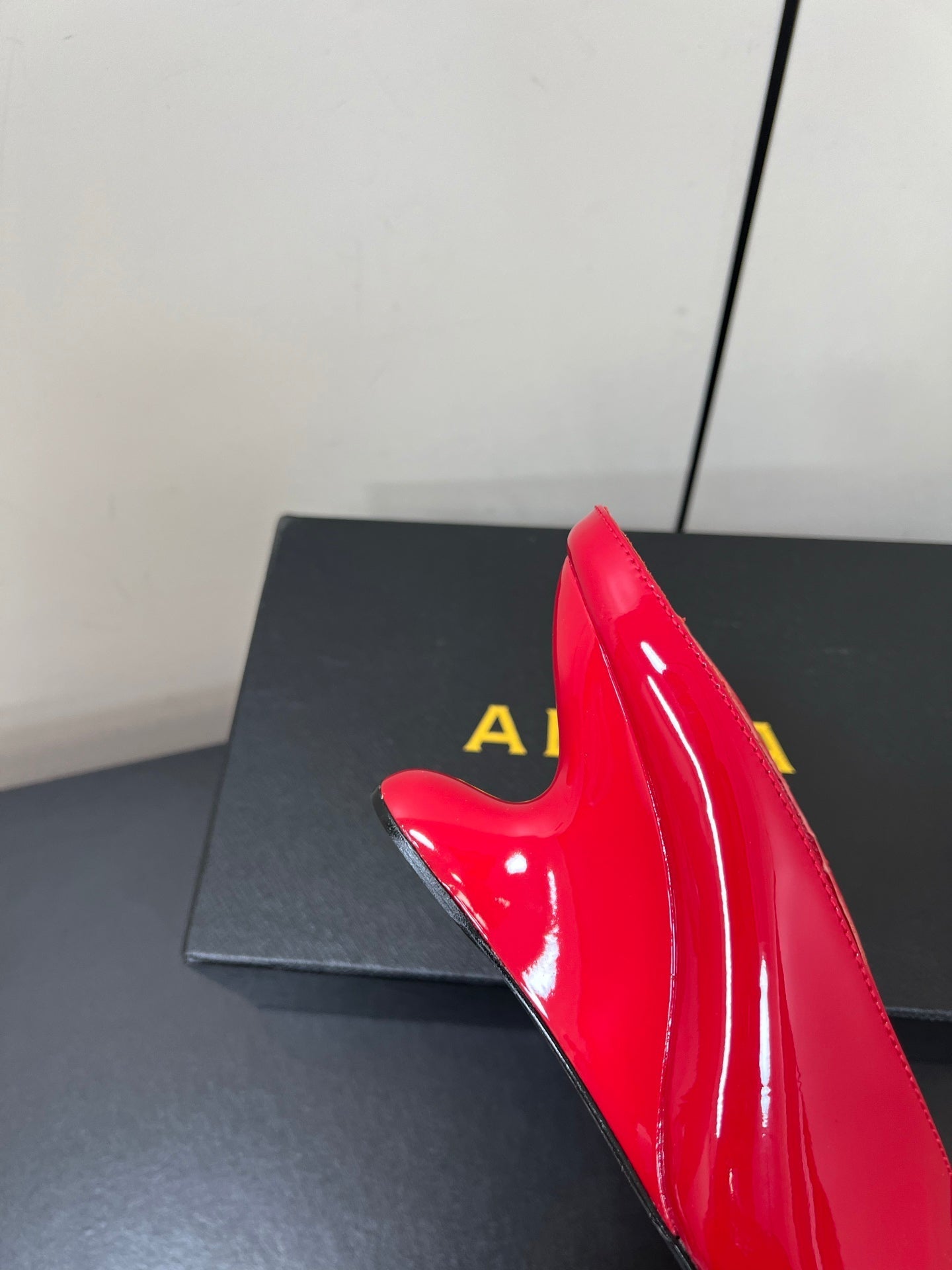 ALAIA WEDGE MULES 25S IN RED LAMBSKIN