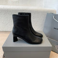 ANKLE BOOTS IN BLACK LOGO EMBOSSED SOFT SHEEPSKIN
