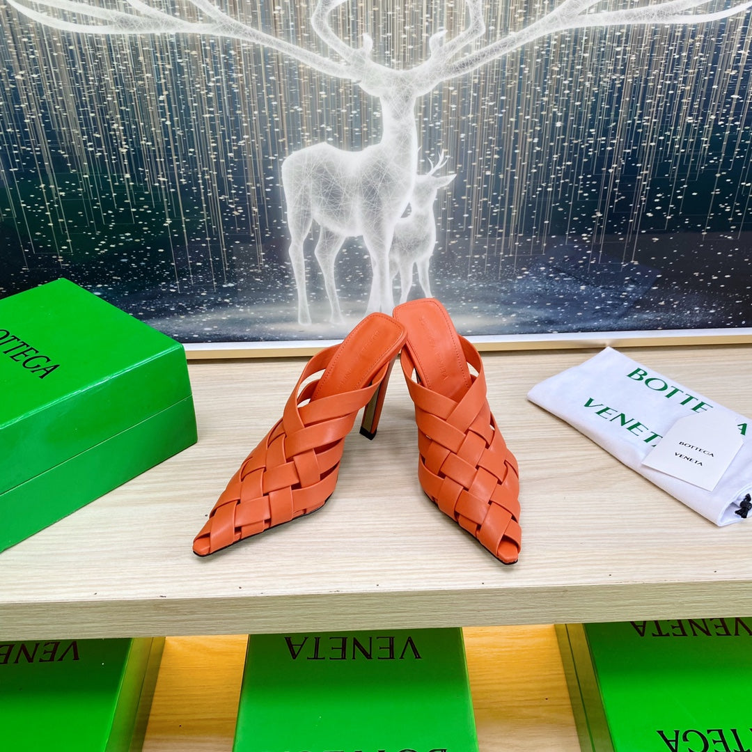 BOTTEGA VENETA ALFIE LEATHER HIGH MULES IN VIVID ORANGE CALFSKIN WITH WOVEN DESIGN