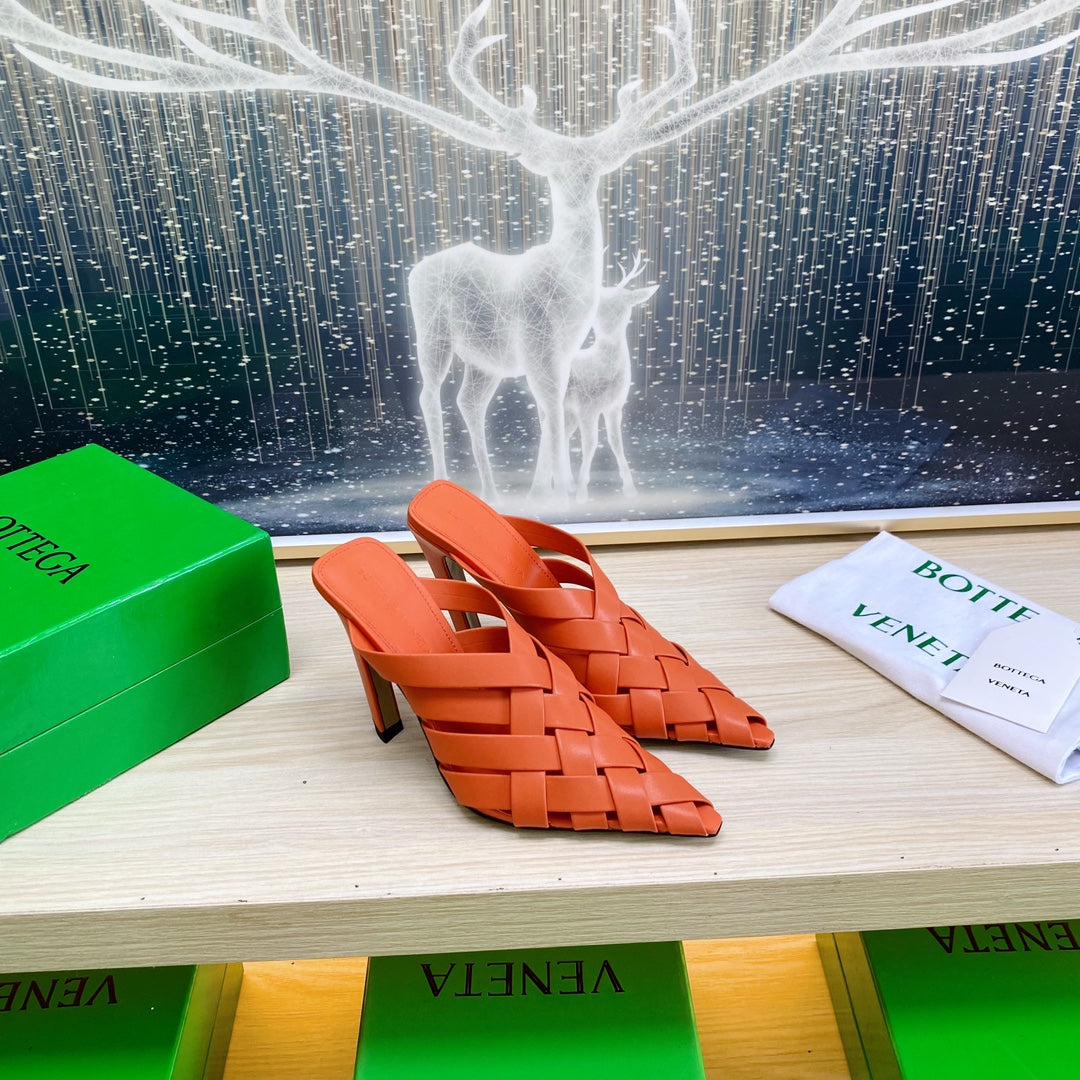 BOTTEGA VENETA ALFIE LEATHER HIGH MULES IN VIVID ORANGE CALFSKIN WITH WOVEN DESIGN