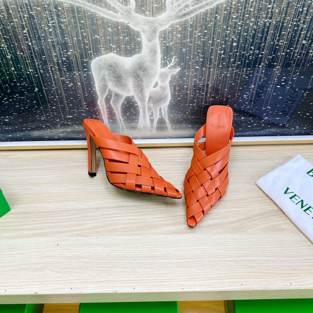 BOTTEGA VENETA ALFIE LEATHER HIGH MULES IN VIVID ORANGE CALFSKIN WITH WOVEN DESIGN