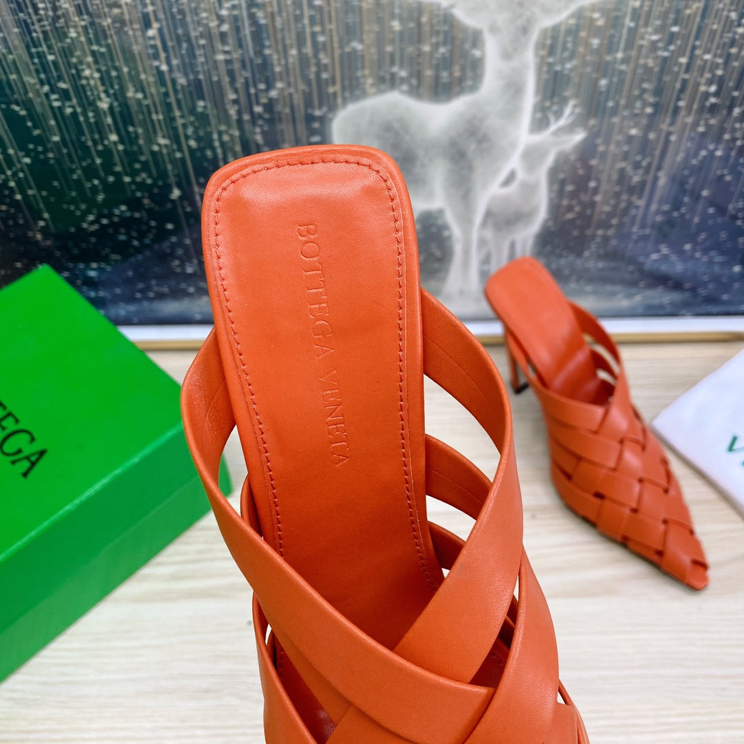 BOTTEGA VENETA ALFIE LEATHER HIGH MULES IN VIVID ORANGE CALFSKIN WITH WOVEN DESIGN