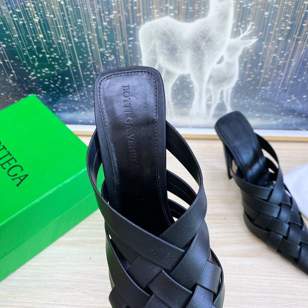 BOTTEGA VENETA ALFIE LEATHER HIGH MULES IN BLACK CALFSKIN WITH WOVEN DESIGN