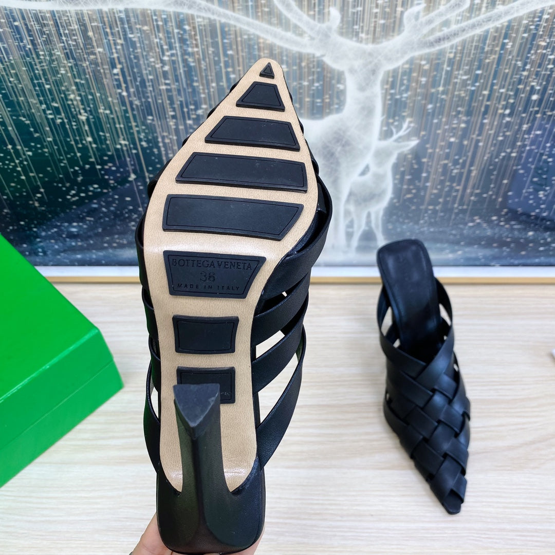 BOTTEGA VENETA ALFIE LEATHER HIGH MULES IN BLACK CALFSKIN WITH WOVEN DESIGN