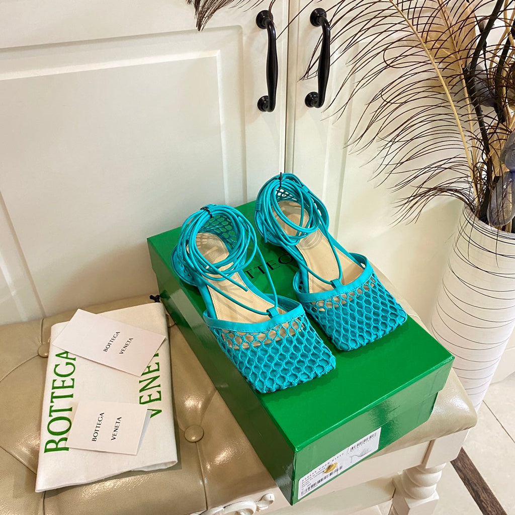 BOTTEGA VENETA STRETCH LACE-UP FLAT SANDAL IN CERULEAN BLUE METALLIZED MESH AND LEATHER