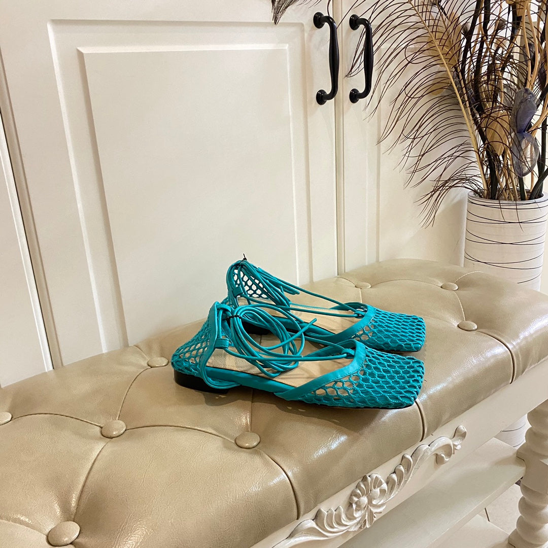 BOTTEGA VENETA STRETCH LACE-UP FLAT SANDAL IN CERULEAN BLUE METALLIZED MESH AND LEATHER