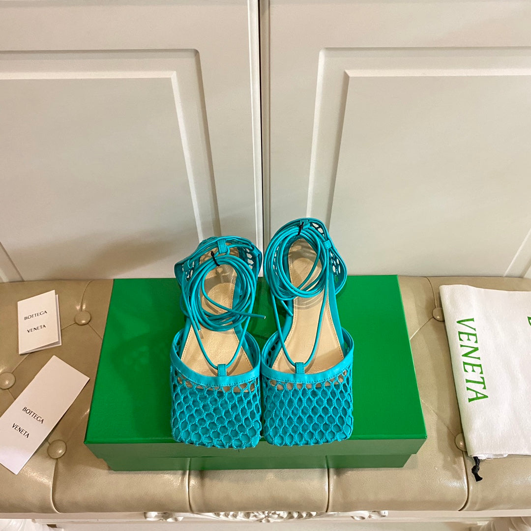 BOTTEGA VENETA STRETCH LACE-UP FLAT SANDAL IN CERULEAN BLUE METALLIZED MESH AND LEATHER