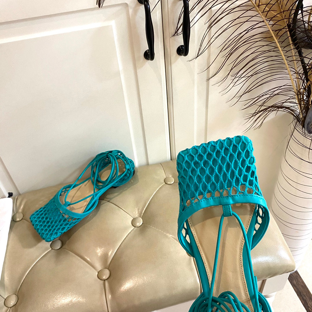 BOTTEGA VENETA STRETCH LACE-UP FLAT SANDAL IN CERULEAN BLUE METALLIZED MESH AND LEATHER