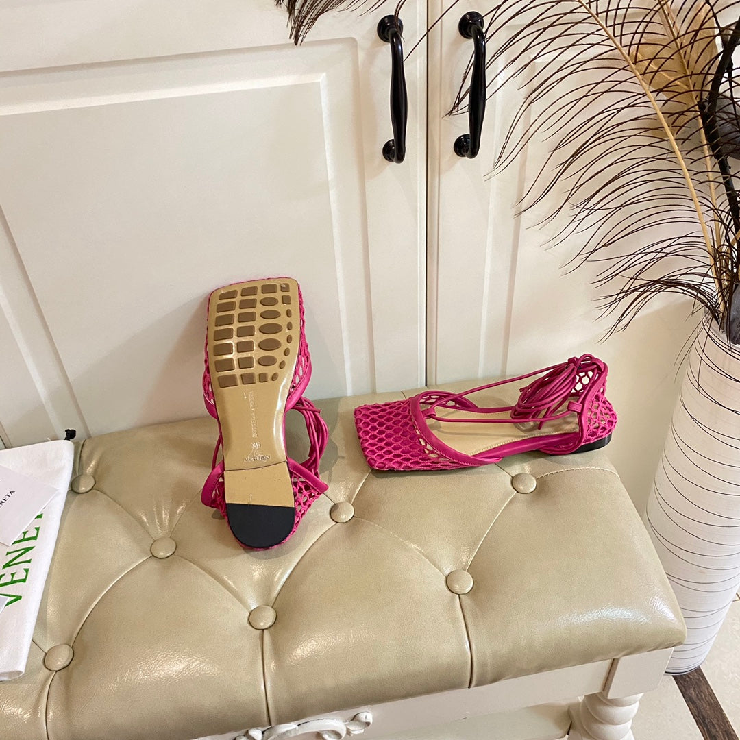 BOTTEGA VENETA STRETCH LACE-UP FLAT SANDAL IN BRIGHT PINK METALLIZED MESH AND LEATHER
