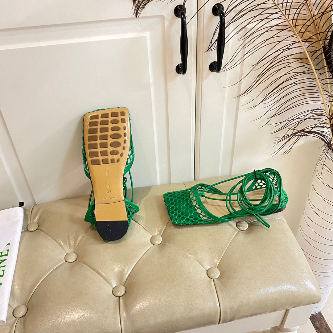 BOTTEGA VENETA STRETCH LACE-UP FLAT SANDAL IN COOL GREEN METALLIZED MESH AND LEATHER