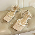 BOTTEGA VENETA STRETCH LACE-UP FLAT SANDAL IN WHITE CREAM METALLIZED MESH AND LEATHER
