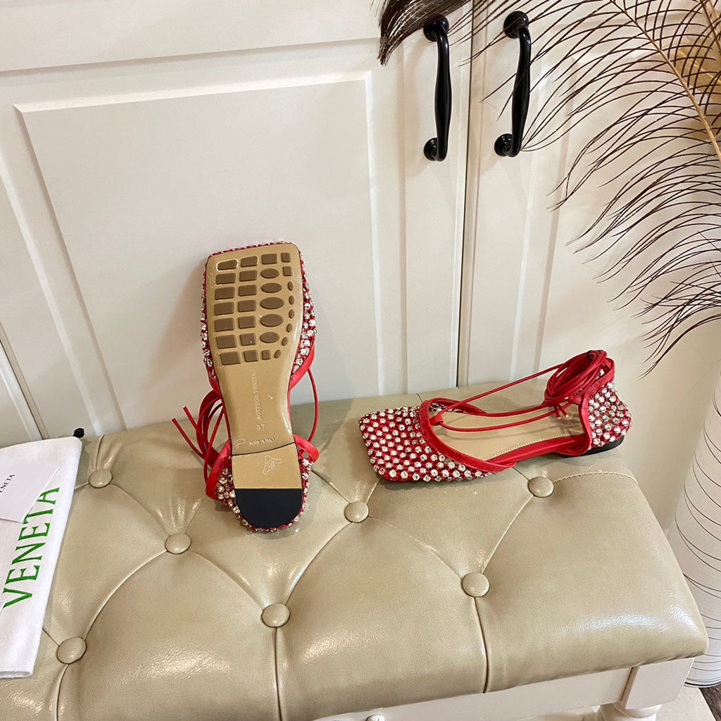 BOTTEGA VENETA LACE-UP FLAT SANDAL IN RUBY RED METALLIZED MESH AND LEATHER WITH RHINSTONES