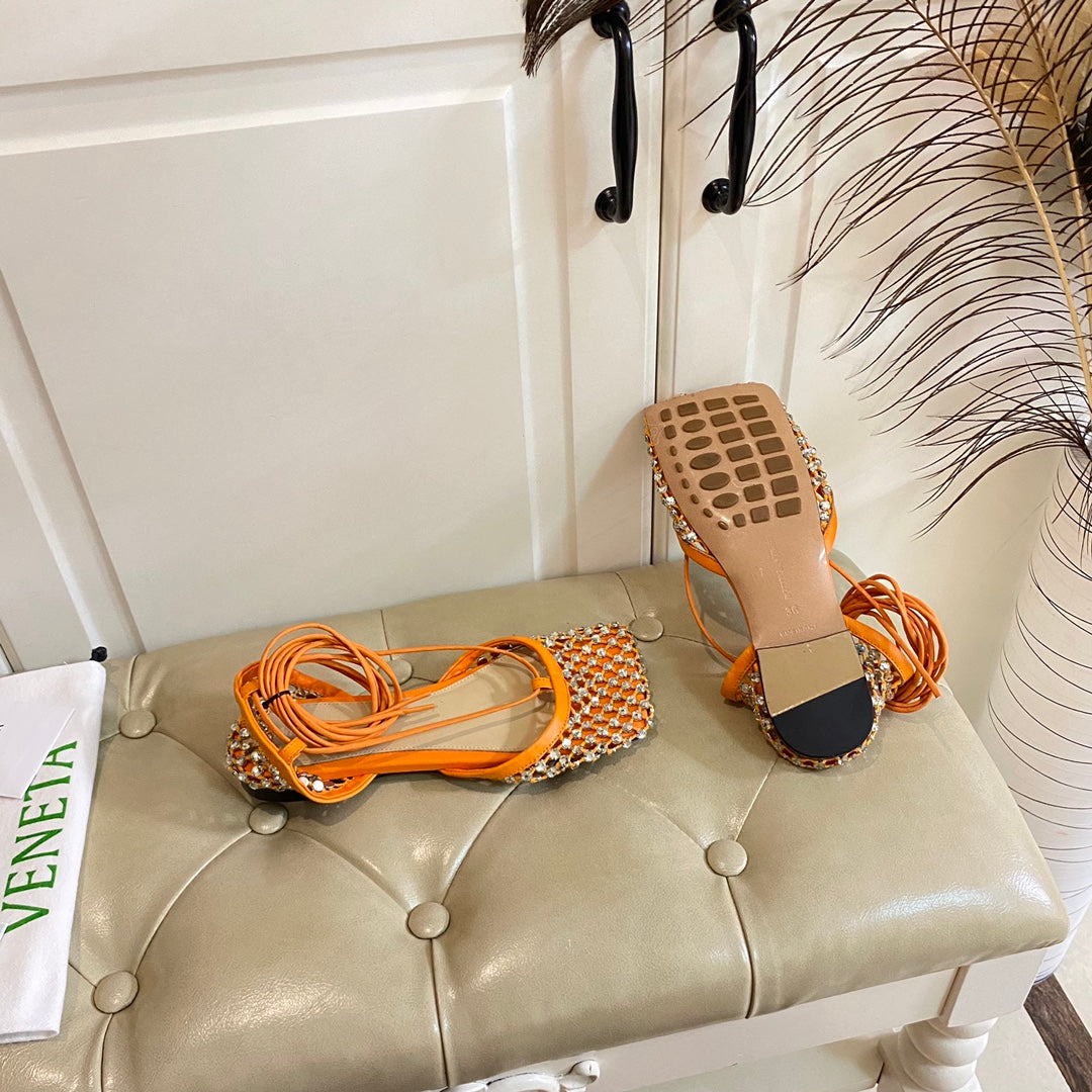 BOTTEGA VENETA LACE-UP FLAT SANDAL IN VIVID ORANGE METALLIZED MESH AND LEATHER WITH RHINSTONES