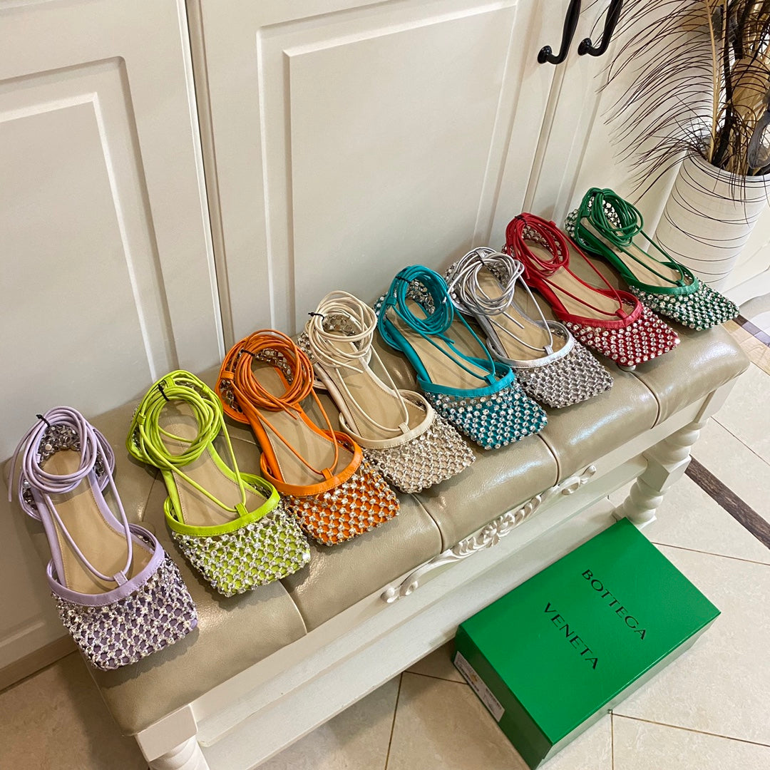 BOTTEGA VENETA LACE-UP FLAT SANDAL IN VIVID ORANGE METALLIZED MESH AND LEATHER WITH RHINSTONES