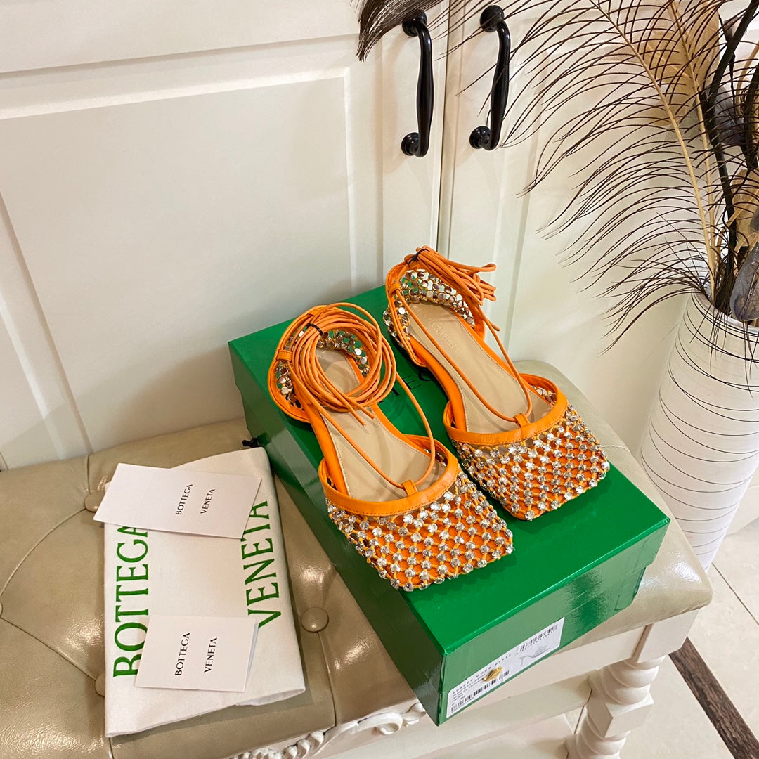 BOTTEGA VENETA LACE-UP FLAT SANDAL IN VIVID ORANGE METALLIZED MESH AND LEATHER WITH RHINSTONES