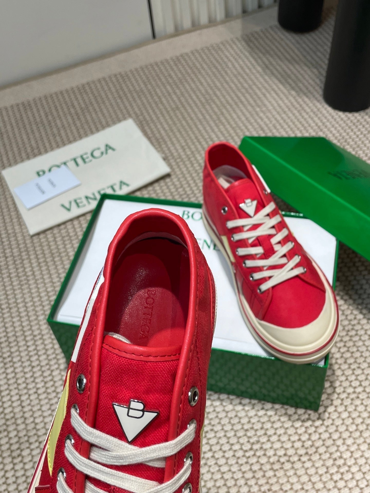 BOTTEGA VENETA ELIOT SNEAKER IN CHERRY RED CANVAS AND CALFSKIN