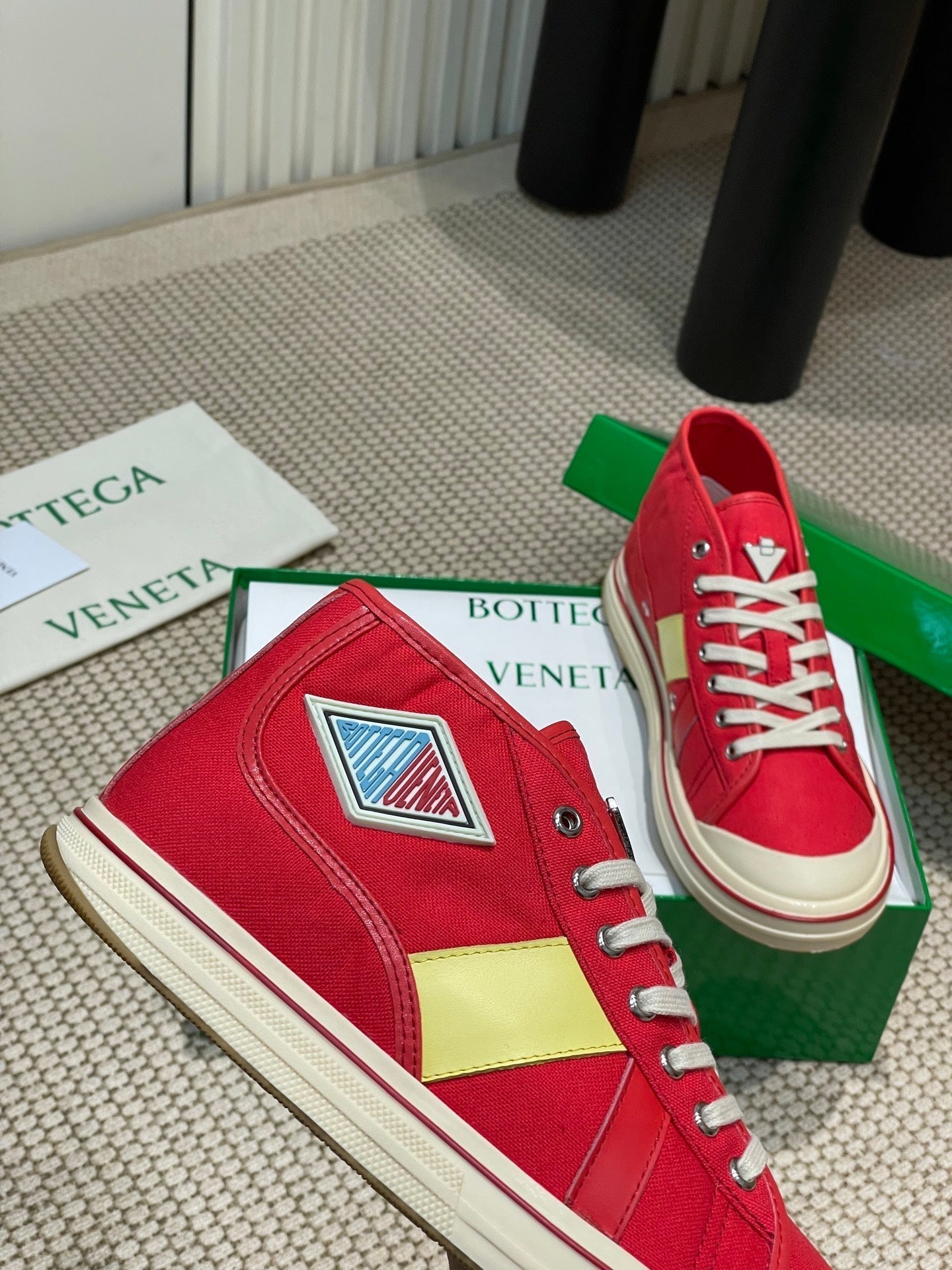 BOTTEGA VENETA ELIOT SNEAKER IN CHERRY RED CANVAS AND CALFSKIN