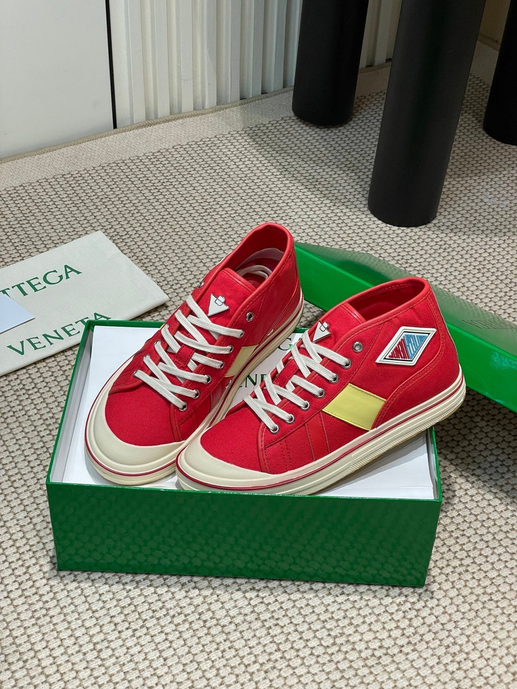 BOTTEGA VENETA ELIOT SNEAKER IN CHERRY RED CANVAS AND CALFSKIN