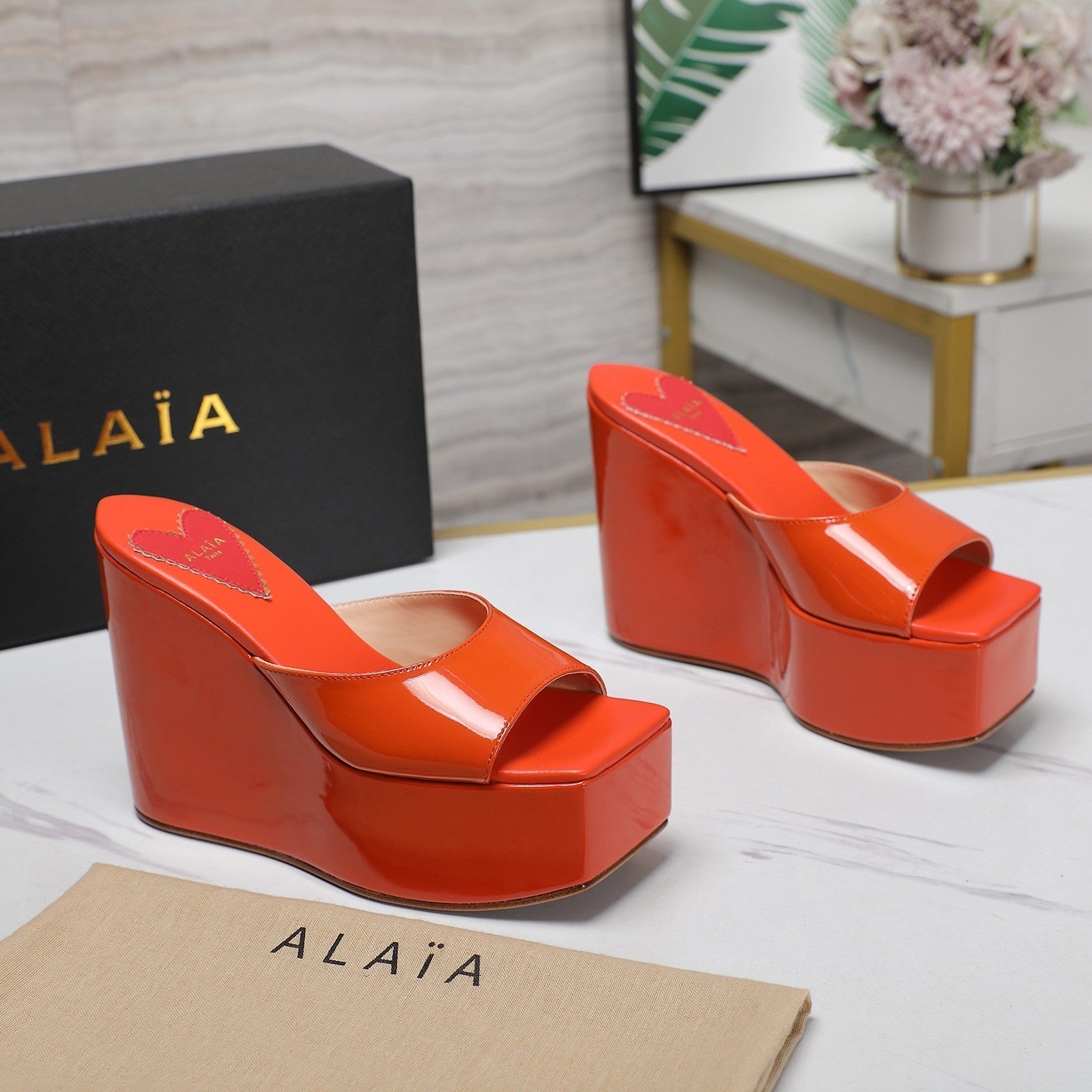 ALAIA PLATFORM WEDGE IN VIVID ORANGE LAMBSKIN WITH RED HEART