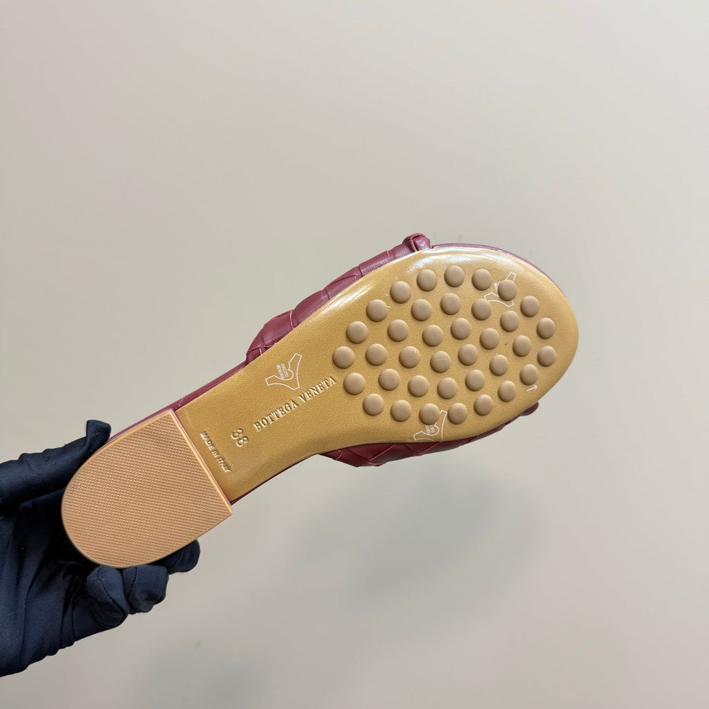 BOTTEGA VENETA BLINK FLAT MULE IN BERRY RED INTRECCIATO LEATHER