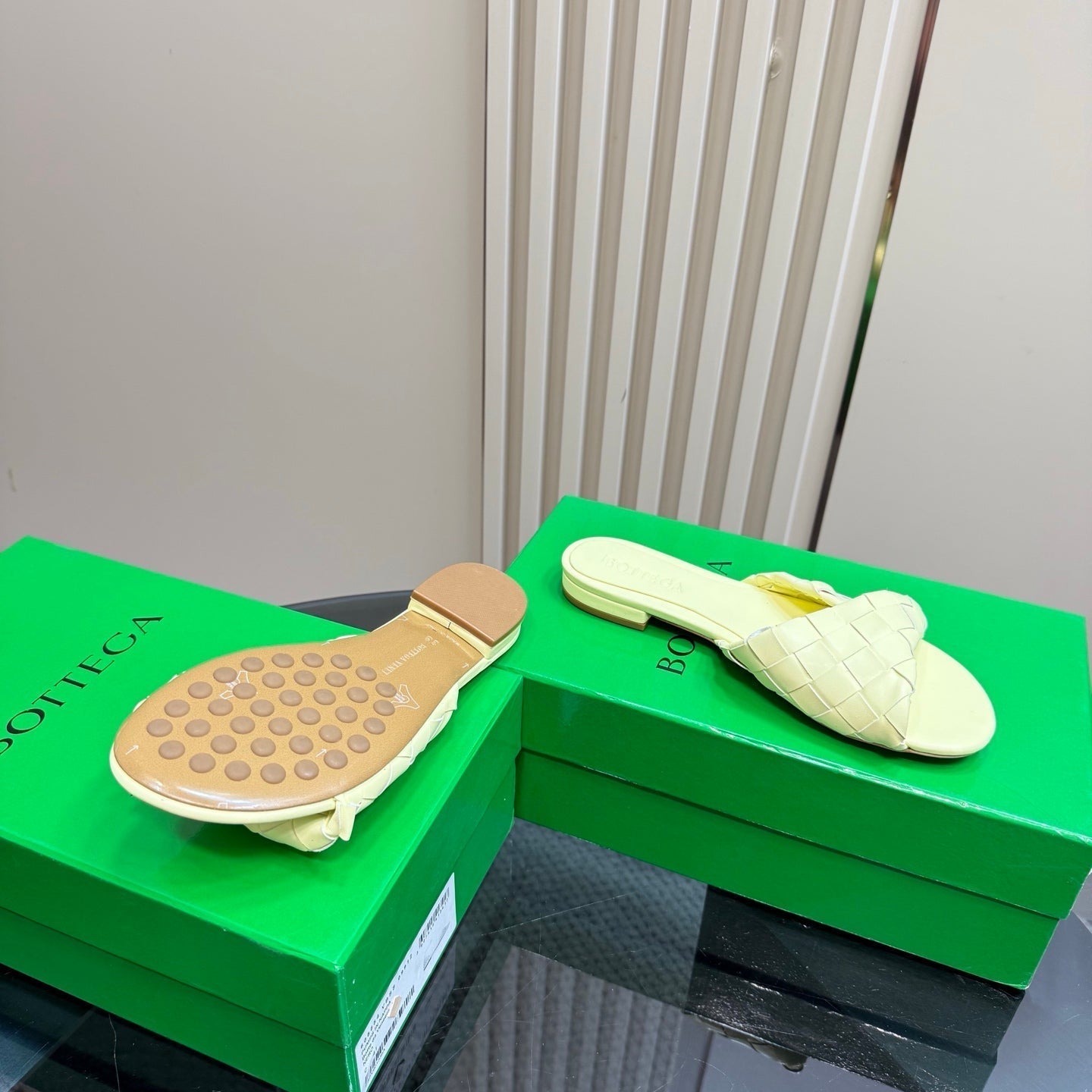 BOTTEGA VENETA BLINK FLAT MULE IN PASTEL YELLOW INTRECCIATO LEATHER
