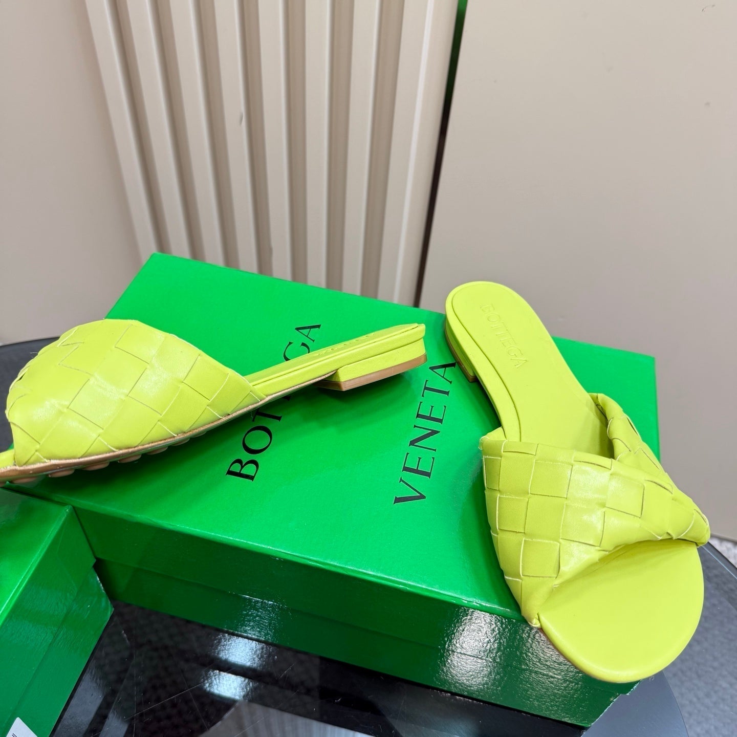 BOTTEGA VENETA BLINK FLAT MULE IN NEON YELLOW INTRECCIATO LEATHER