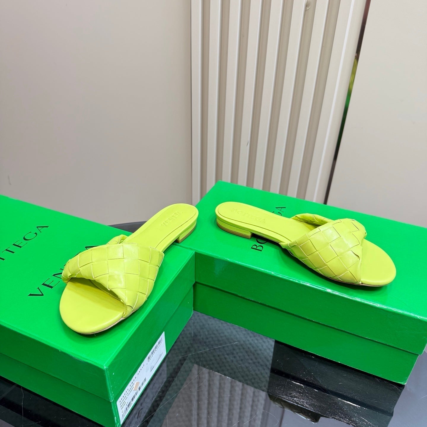 BOTTEGA VENETA BLINK FLAT MULE IN NEON YELLOW INTRECCIATO LEATHER