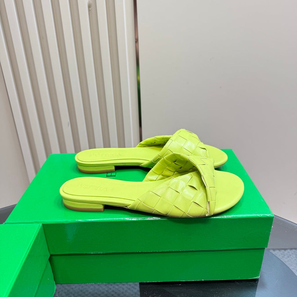 BOTTEGA VENETA BLINK FLAT MULE IN NEON YELLOW INTRECCIATO LEATHER