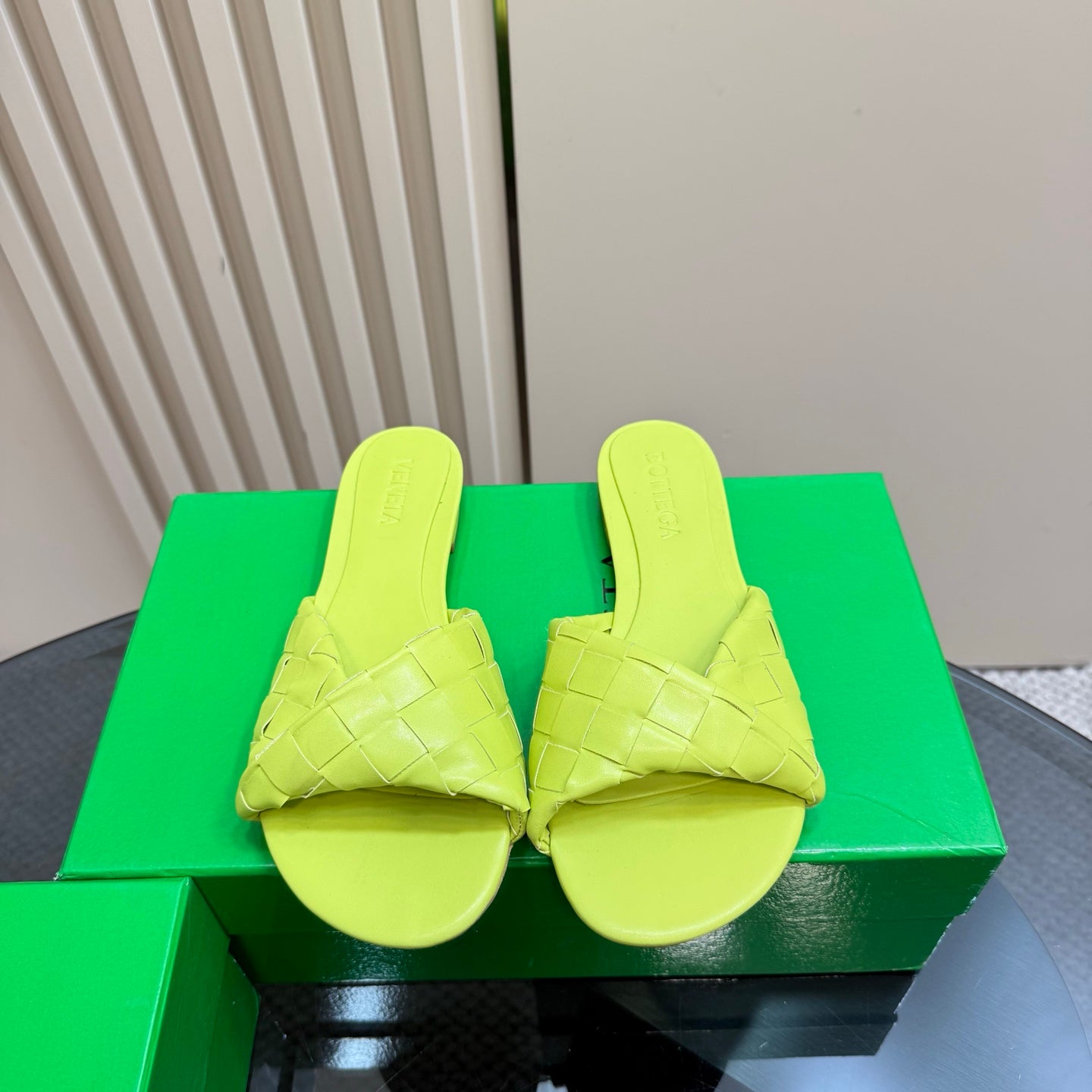 BOTTEGA VENETA BLINK FLAT MULE IN NEON YELLOW INTRECCIATO LEATHER