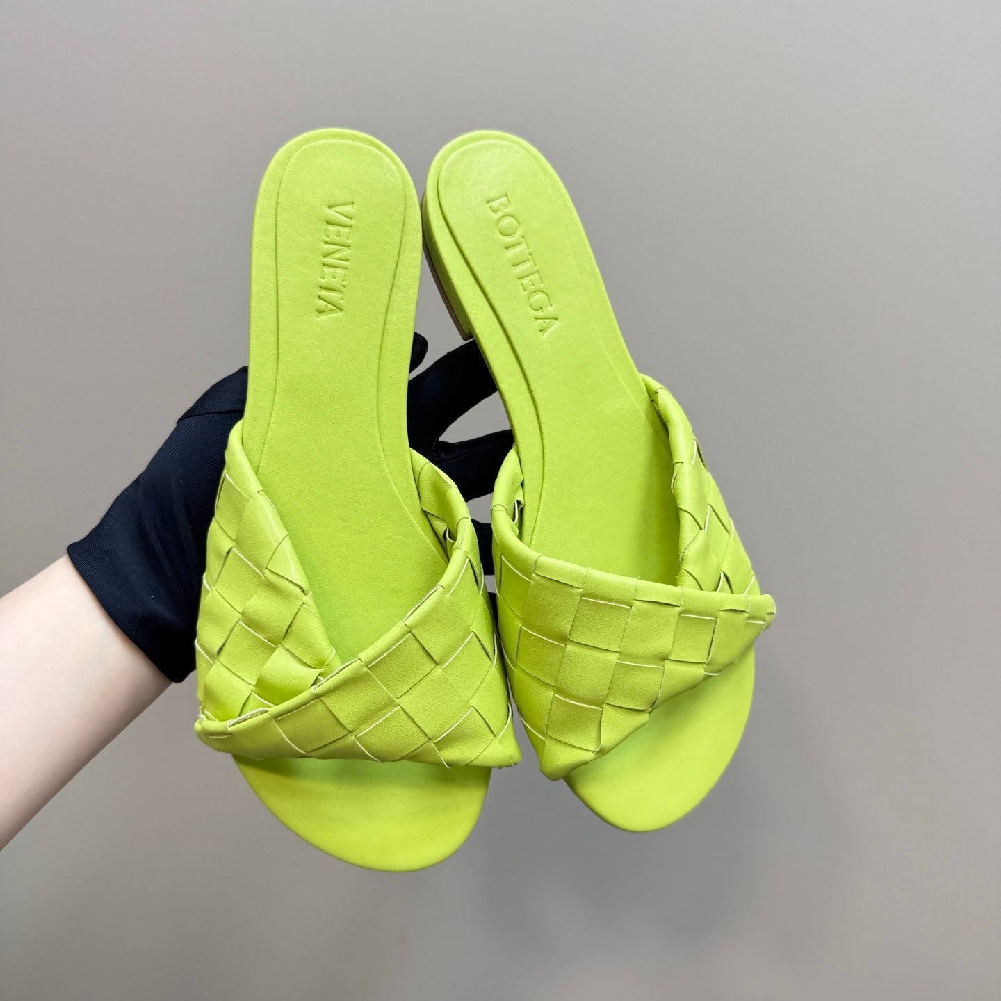 BOTTEGA VENETA BLINK FLAT MULE IN NEON YELLOW INTRECCIATO LEATHER