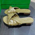 BOTTEGA VENETA BLINK FLAT MULE IN OLIVE GREEN INTRECCIATO LEATHER