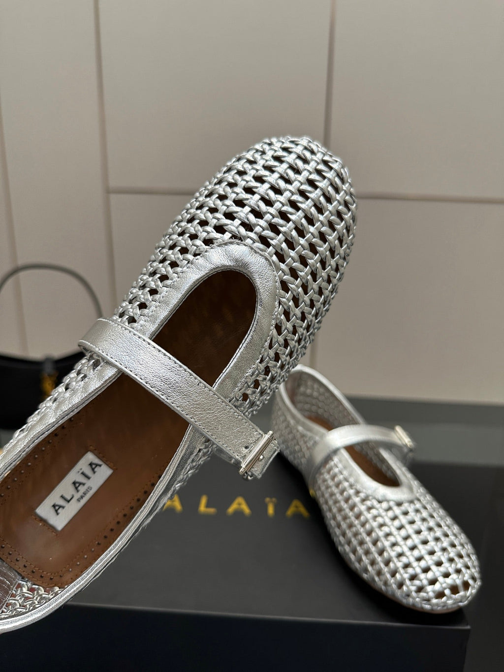 ALAIA MARY JANE FLAT 25S IN SILVER WOVEN MESH
